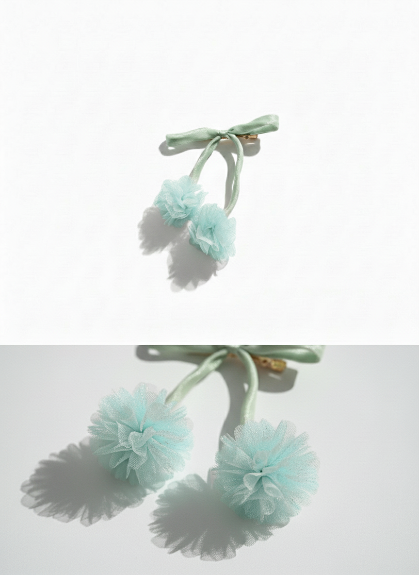 Light blue floral hair accessories on a white background